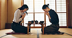 Couple, bow for hello and eating food, Asian people on date with respect, culture and love together in Japan. Hungry for Japanese cuisine, trust with commitment and greeting for religion and care