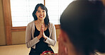 Asian people, bow for hello and eating food, couple on date with respect, culture and love together in Japan. Hungry for Japanese cuisine, trust with commitment and greeting for religion and care