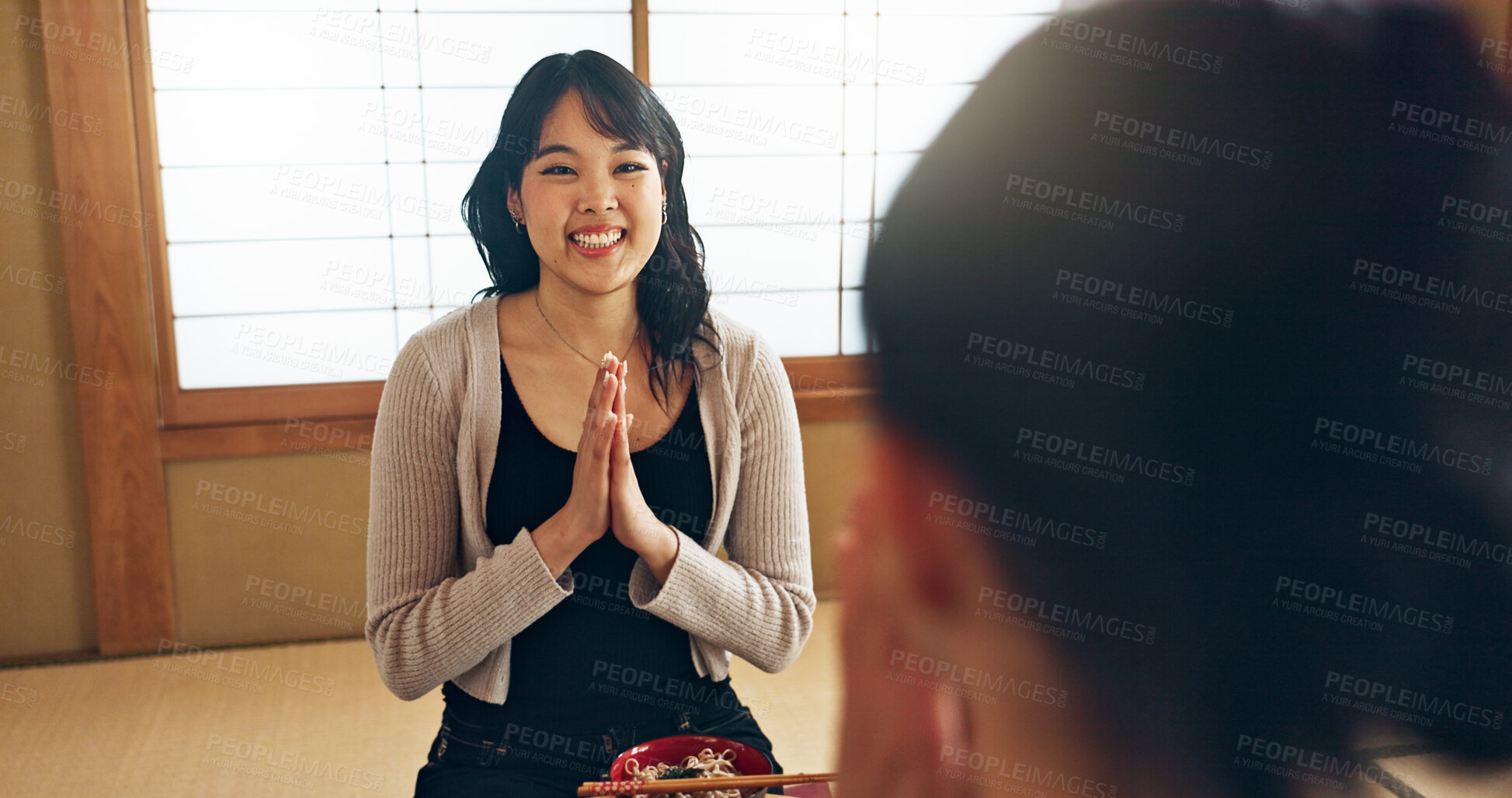 Buy stock photo Asian people, bow for hello and eating food, couple on date with respect, culture and love together in Japan. Hungry for Japanese cuisine, trust with commitment and greeting for religion and care