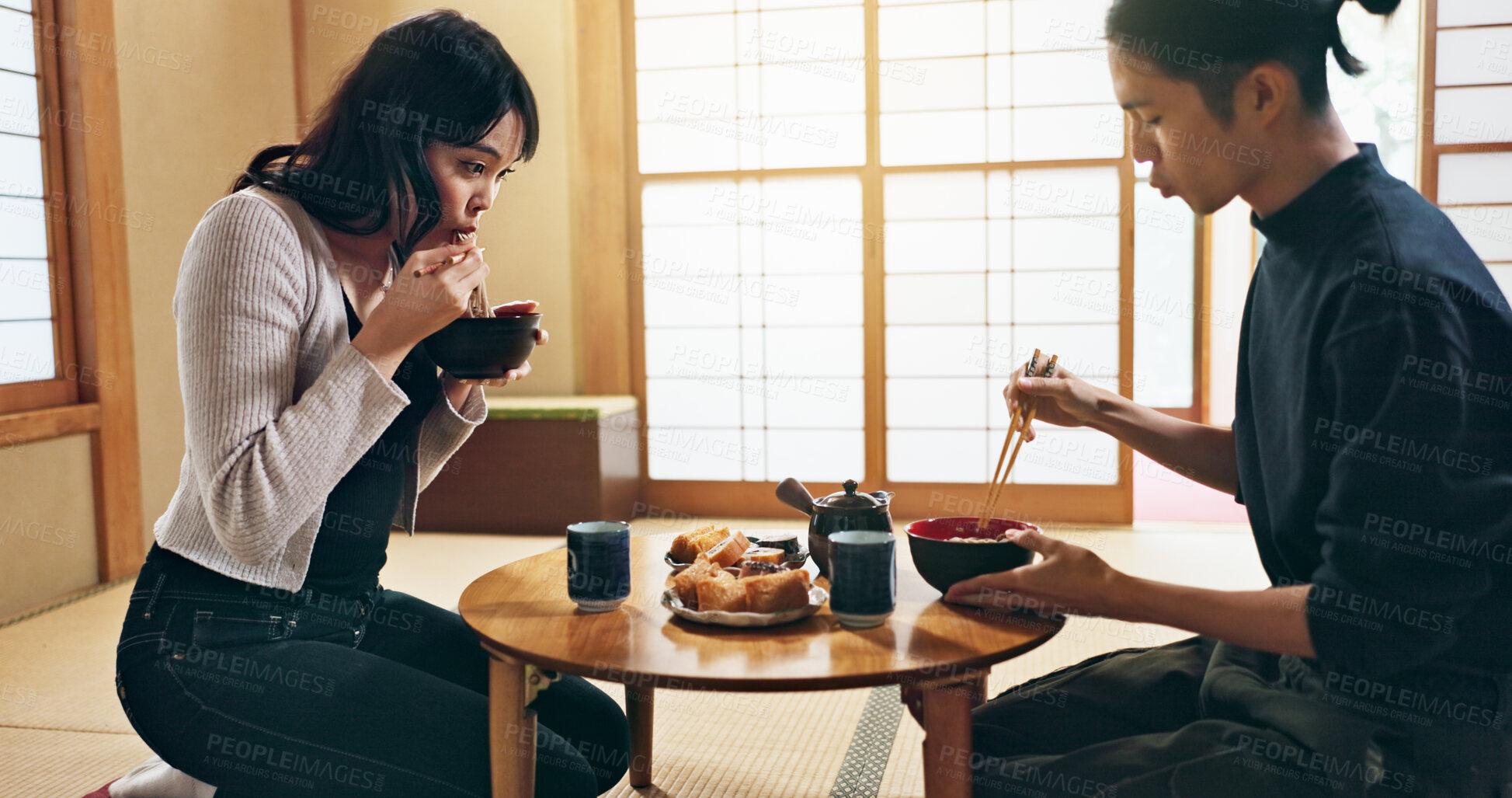 Buy stock photo Asian people, bow for hello and eating food, couple on date with respect, culture and love together in Japan. Hungry for Japanese cuisine, trust with commitment and greeting for religion and care
