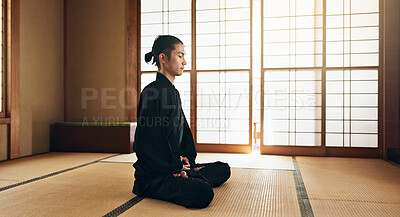 Martial arts man, meditation and exercise in Japanese dojo with mindfulness, zen or chakra balance in morning. Fighter, mma or karate person with peace, breathing and calm for yoga, wellness or floor