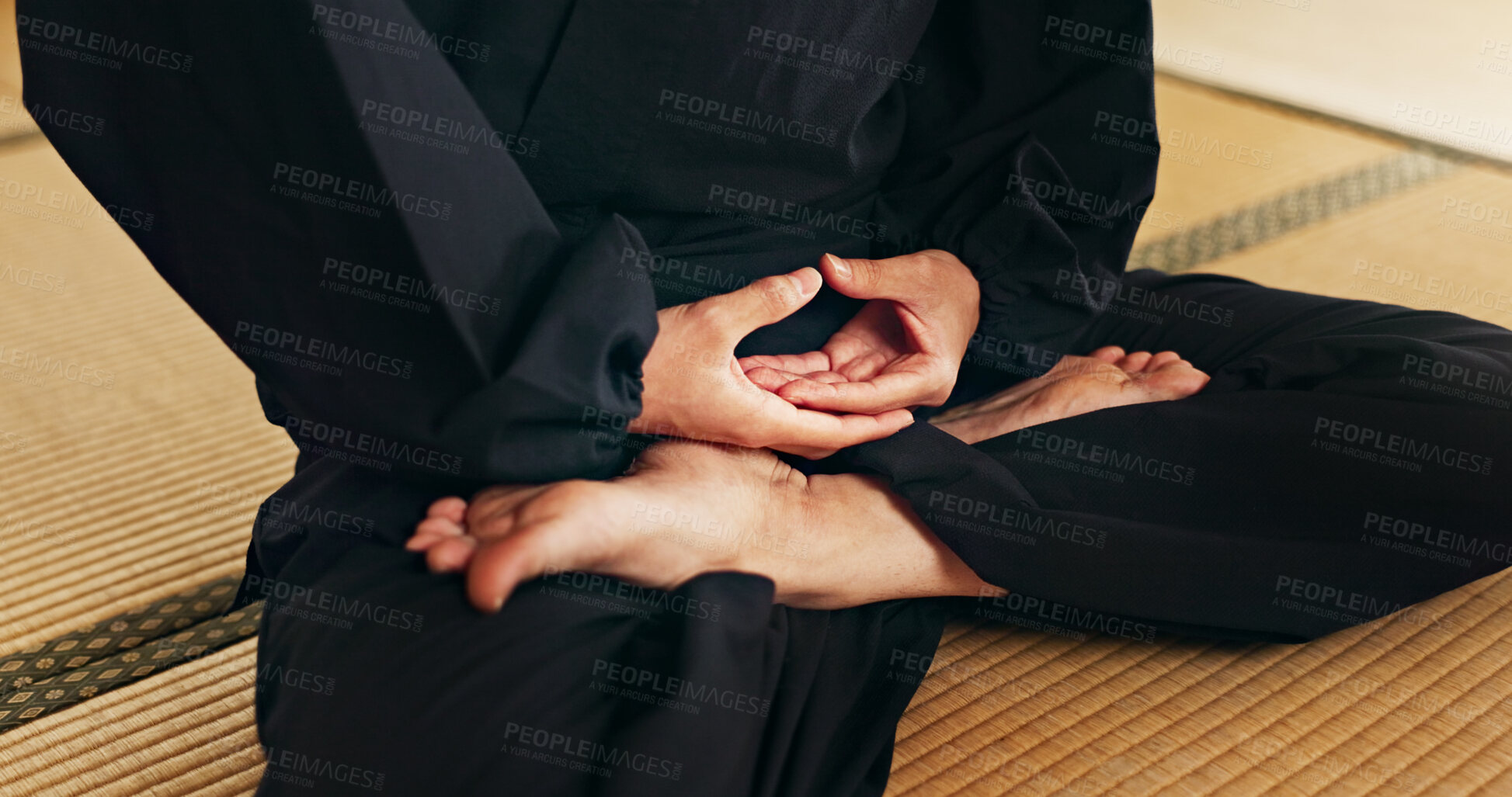 Buy stock photo Martial arts person, meditation and floor with hands, feet and peace in dojo with spiritual guide for fight. Yoga, chakra balance and zen exercise for peace, calm or breathe for mma, karate or health