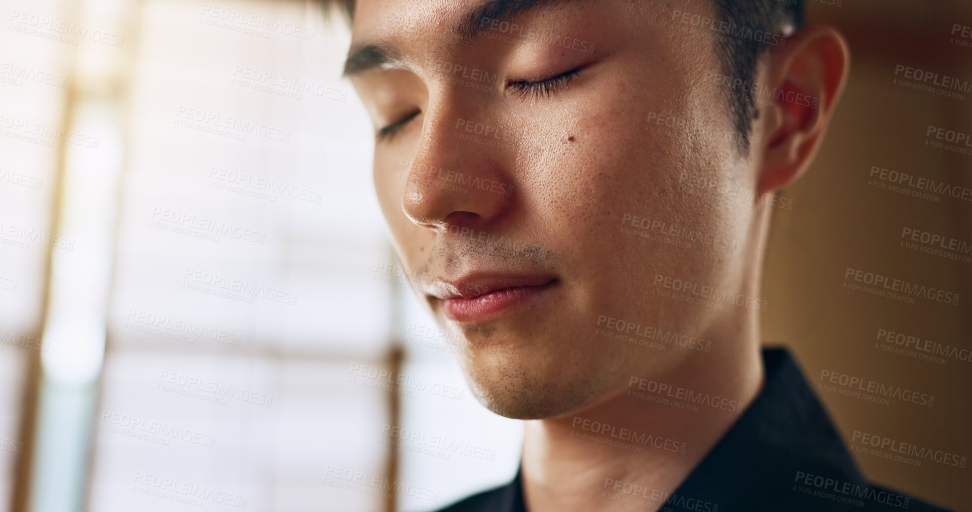 Buy stock photo Thinking, calm and young Asian man with meditation, zen and relaxing face expression at home. Idea, mindfulness and male person with memory, reflection and breathing exercise in modern apartment.