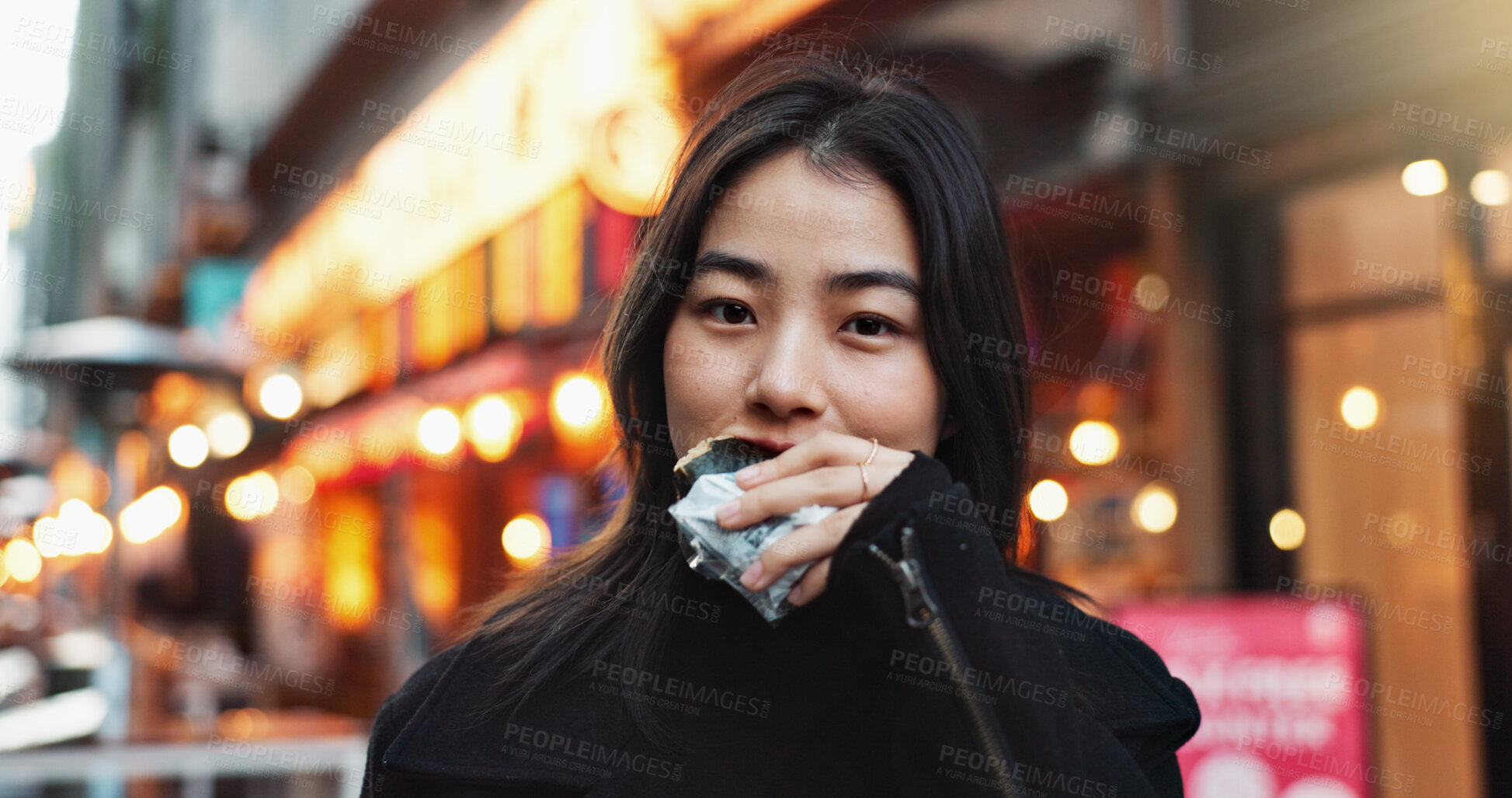 Buy stock photo Travel, eating and Asian woman with onigiri in the city on exploring vacation, adventure or holiday.Portrait, food and young female person enjoying a Japanese snack or meal in town on weekend trip.