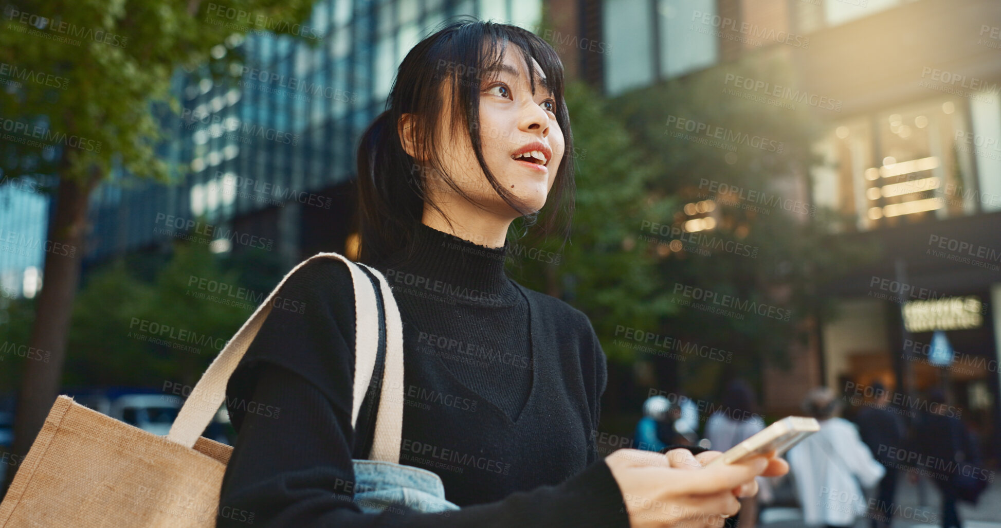 Buy stock photo Japanese woman, phone and direction in city with smile, walking or thinking with map by buildings. Person, pedestrian and smartphone with location, schedule or information for address on metro street