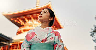 Woman, shinto temple and traditional clothes in culture, building or religion with vision for zen balance. Japanese person, idea and buddhism in faith, mindfulness or thinking with low angle in Kyoto