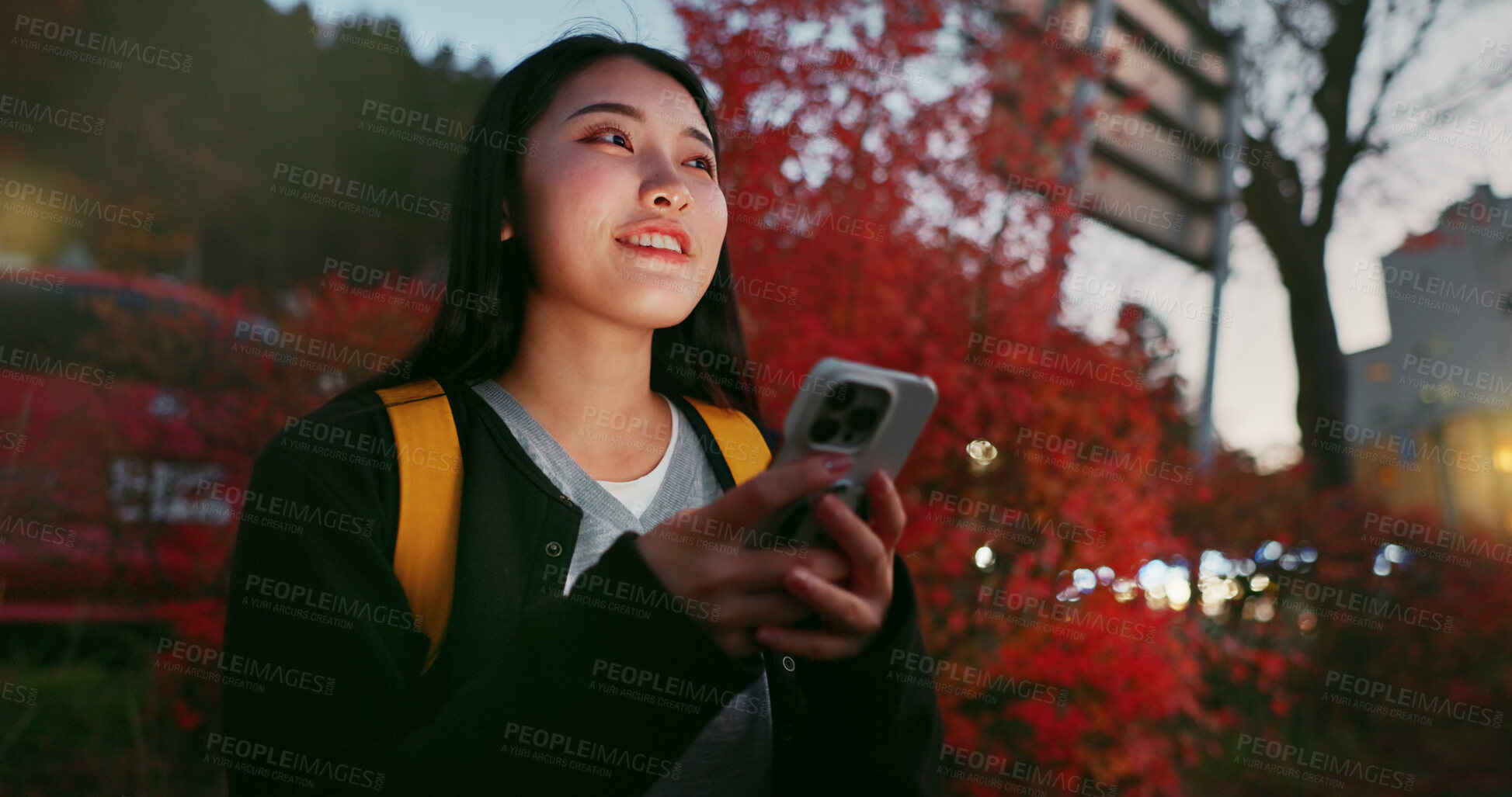 Buy stock photo Happy asian woman, phone and night for communication, social media or outdoor networking in city. Female person relax on mobile smartphone in late evening for online chatting in urban town of Japan