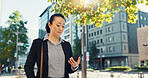 Cellphone, walking and business woman in the city networking on social media, mobile app or internet. Technology, street and professional Asian female person with phone commuting in street in town.