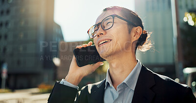 Asian man, phone call and laughing in city for funny joke, conversation or outdoor networking. Happy businessman smile and talking on mobile smartphone for fun business discussion in an urban town