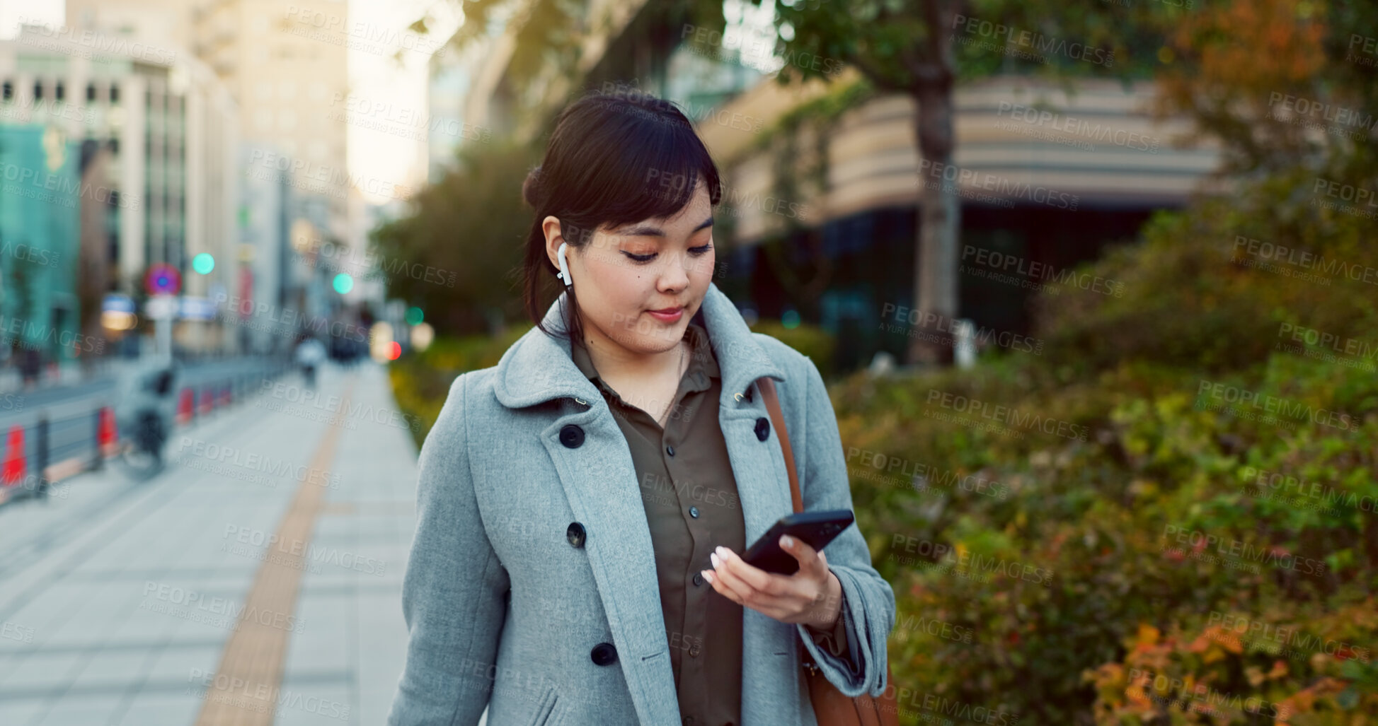Buy stock photo Phone, walking and business woman in the city networking on social media, mobile app or internet. Technology, street and professional Asian female person with cellphone commuting in street in town.