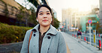 Woman, Asian and walk on sidewalk, travel or commute to work with professional in city with earphones. Listening to music on journey, podcast and commuter on urban street in Tokyo with playlist