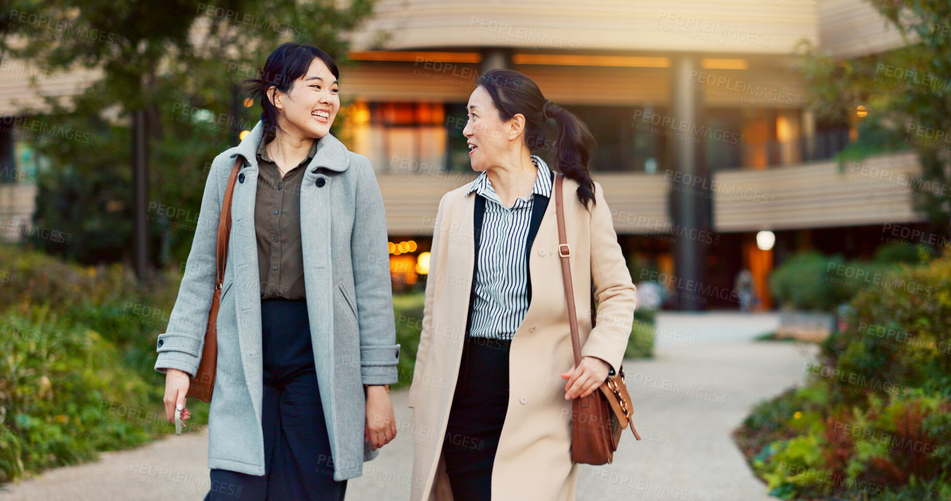 Buy stock photo Walking, conversation and business women in the city talking for communication or bonding. Smile, discussion and professional Asian female people speaking and laughing together commuting in town.