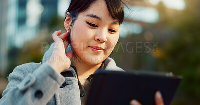 Asian woman, tablet and city for social media, research or communication in outdoor networking. Face of happy female person smile on technology for online search, chatting or texting in an urban town