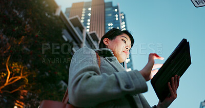 Asian woman, tablet and city for communication, research or social media by building in Japan. Female person or employee on technology for online search, chat or outdoor networking in an urban town