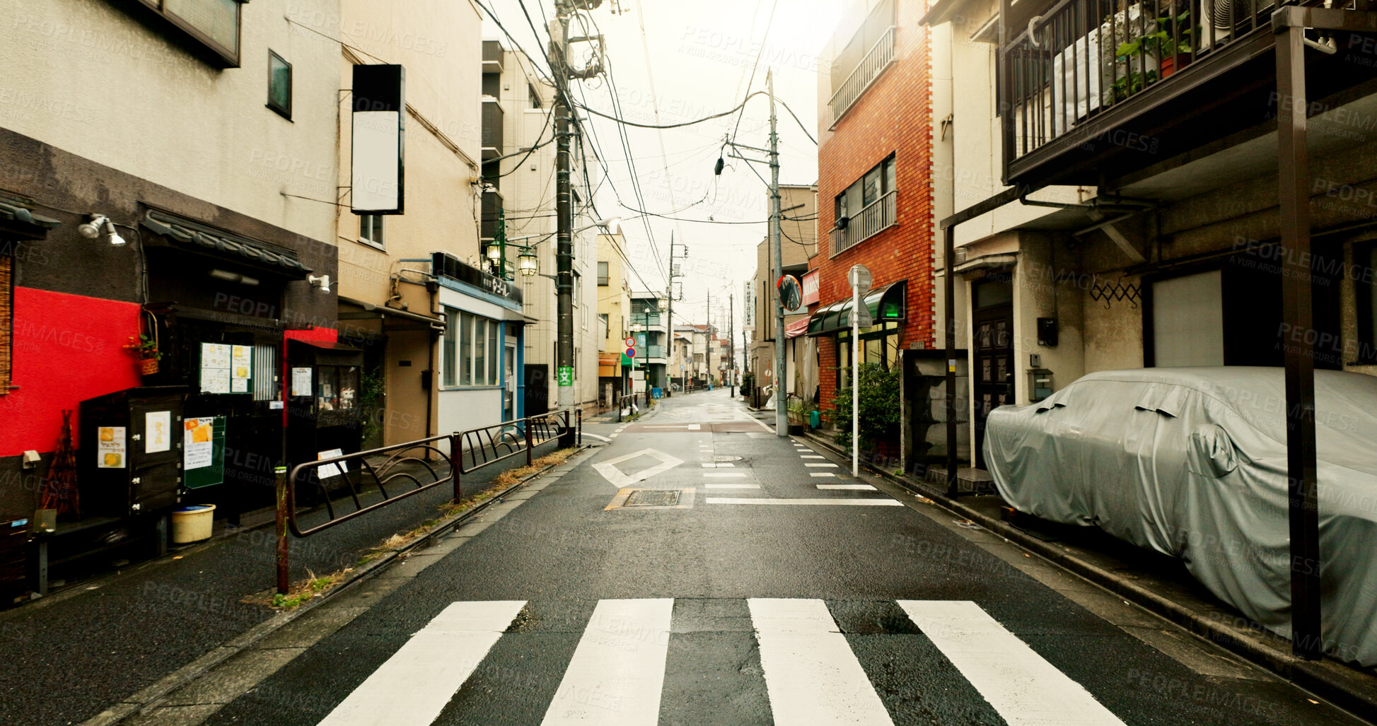 Buy stock photo Cityscape, street and crosswalk for safety, walking and commute for transport in urban location. Road, sidewalk and pedestrian crossing in metro traffic for moving, infrastructure and outdoor travel