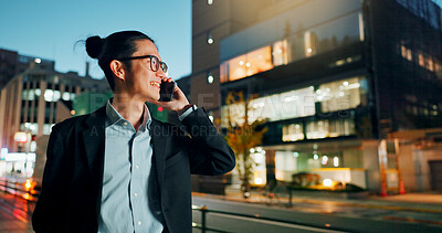 Businessman, phone call and laughing at night in city for funny joke, conversation or outdoor travel. Happy asian man or employee smile and talking on mobile smartphone in late evening for discussion