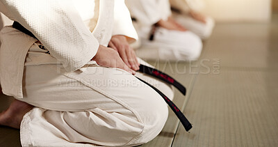 Black belt students, bow or master in dojo for aikido practice, discipline or self defense. Combat demonstration, Japanese people learning or training workout for fighting class or education on floor