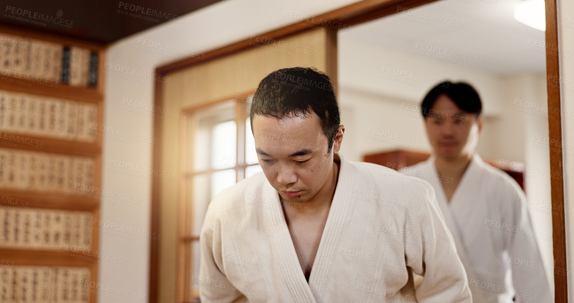 Buy stock photo Men, Japanese and bow in aikido training for respect discipline in Tokyo for learning, combat or professional class. Male person, gesture and team fitness or fighting education, martial arts or skill