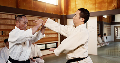 Men, aikido fighting and self defence for training, practice and black belt students for martial arts. Sensei, professional and technique with discipline, fighter and japanese with physical combat