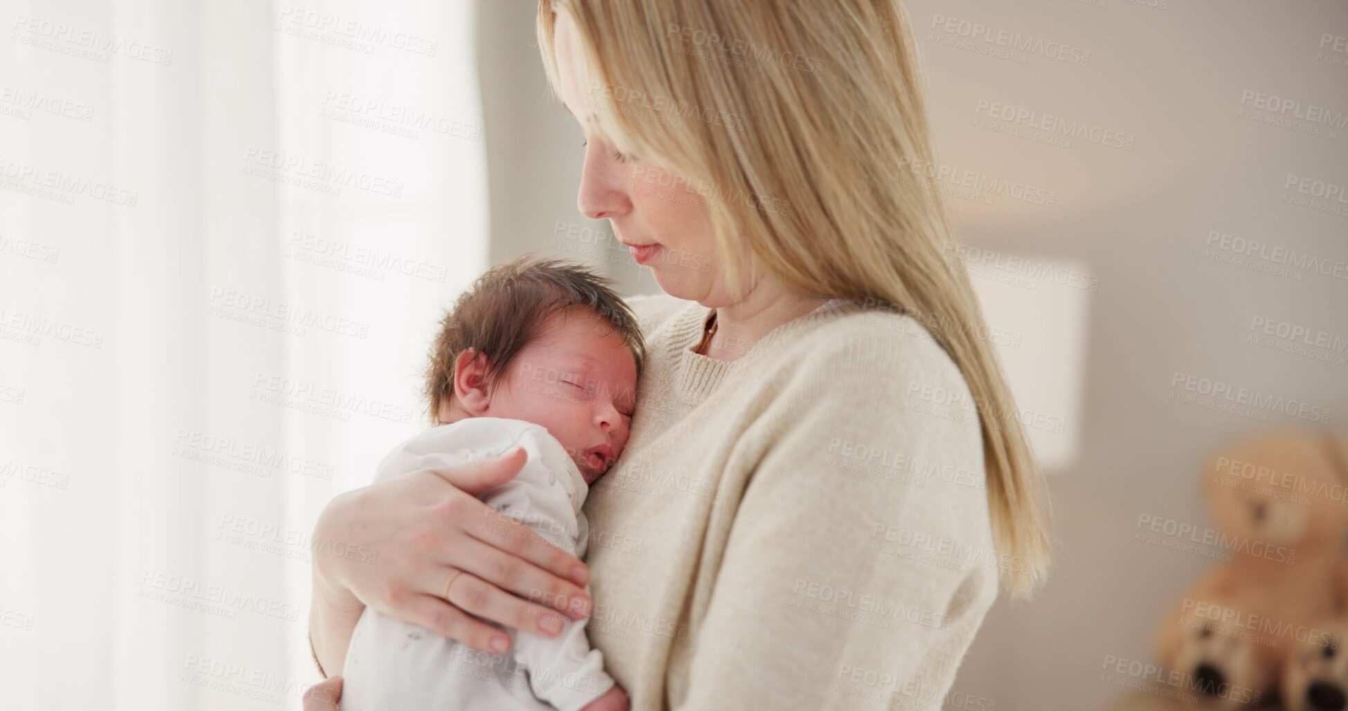 Buy stock photo Family, love and mother with baby sleeping for bonding, relationship and child development at home. Newborn, motherhood and mom carrying infant for care, support and dreaming in nursery room