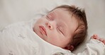 Baby, sleeping youth and nursery bed with morning, nap and dreaming of a young newborn at home. Cozy, sleepy kid and calm with health development from rest and peace in a house with closeup and care