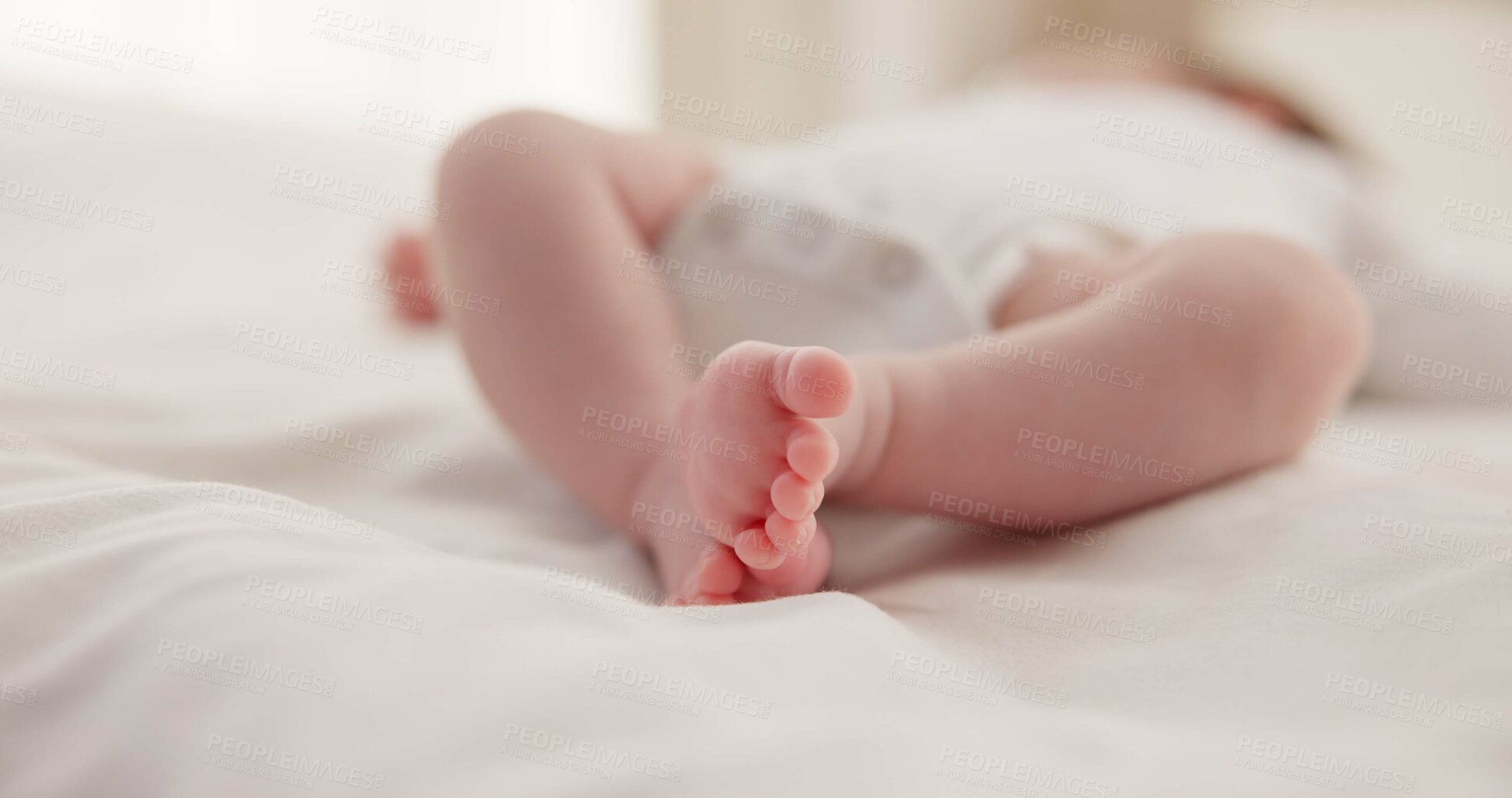 Buy stock photo Sleeping, family and feet of baby on bed for child care, dreaming and relax in nursery. Adorable, cute and closeup of toes of innocent newborn infant for health, wellness and development at home
