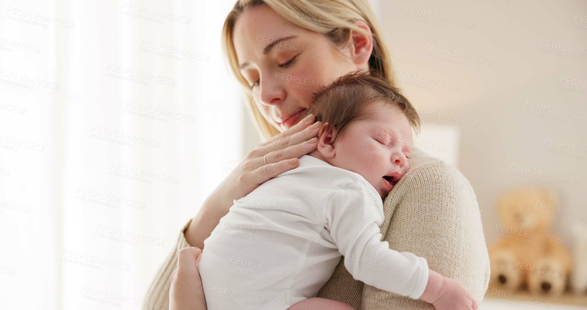 Buy stock photo Sleeping, love and mother carry baby for bonding, relationship and child development together at home. Family, motherhood and happy mom with newborn for care, dreaming and affection in nursery room