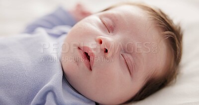 Buy stock photo Face, relax and sleep with a baby on a bed closeup in a home, dreaming during a nap for child development. Growth, calm and rest with an adorable newborn infant asleep in a bedroom for comfort