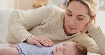 Family, love and a woman on the bed with her baby for sleep, rest or bonding together in a home. Children, bedroom and a mother in an apartment with her newborn infant to relax for care or growth