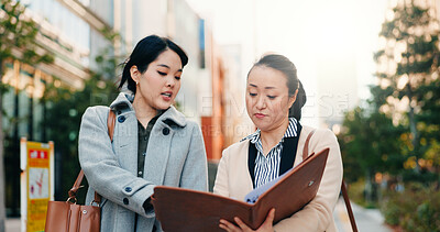 Buy stock photo Businesswomen, japan and discussion by sidewalk in city, walking and collaboration on working in corporate career. Manager, employee or communication in professional job in kyoto or project feedback