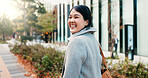 Walking, city and Japanese business woman with smile for morning commute, journey and travel to work. Professional, corporate and portrait of happy person in urban town for career, working and job