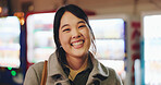 Laughing, face and confident businesswoman on lunch break in japanese town with vending machine technology. Person, portrait and happiness in professional career, funny joke and bokeh in tokyo city