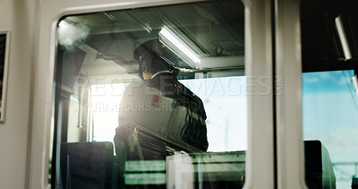 Buy stock photo Train, conductor and window or transportation for travel Japan, control room or adventure. Male person, uniform and railroad tourism in Tokyo for public journey as commuter for job, safety or transit