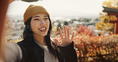 Selfie, travel and face of Japanese woman in nature for holiday, vacation and adventure in Japan. City, happy and portrait of person recording video for social media post, memories and online blog