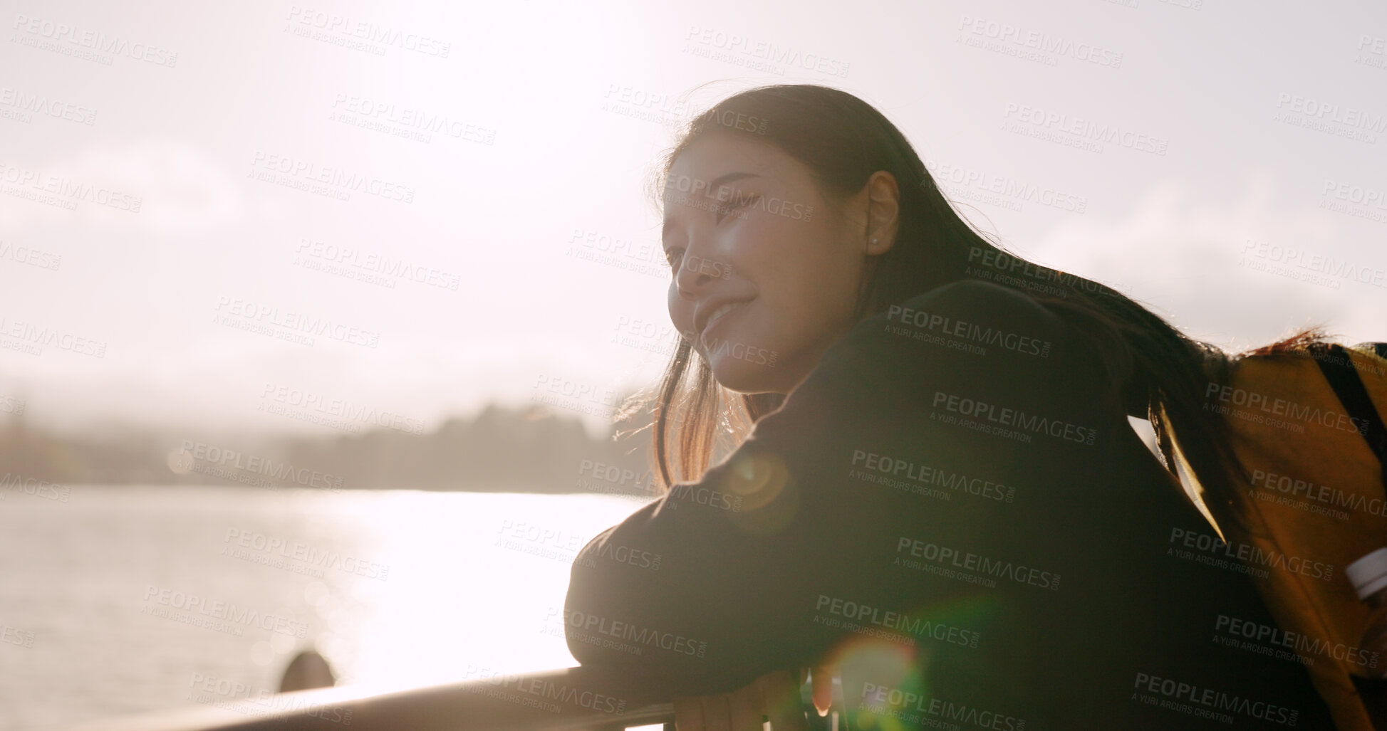 Buy stock photo Japanese woman, lake and backpack with thinking, smile and sunrise on adventure, trip or vacation. Girl, person and happy for holiday with bag, vision and memory by water, river and bridge in Tokyo