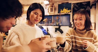 Japanese friends, cheers and coffee in restaurant for dinner, vacation and hot drinks to celebrate on holiday. Women, man and happy together at supper in tokyo city and cappucino by bonding in cafe