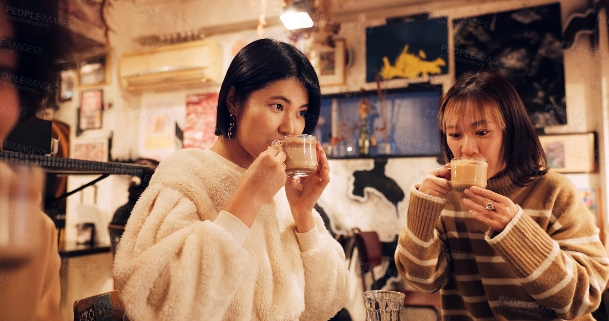 Buy stock photo Japanese friends, cheers and coffee in restaurant for dinner, vacation and hot drinks to celebrate on holiday. Women, man and happy together at supper in tokyo city and cappucino by bonding in cafe