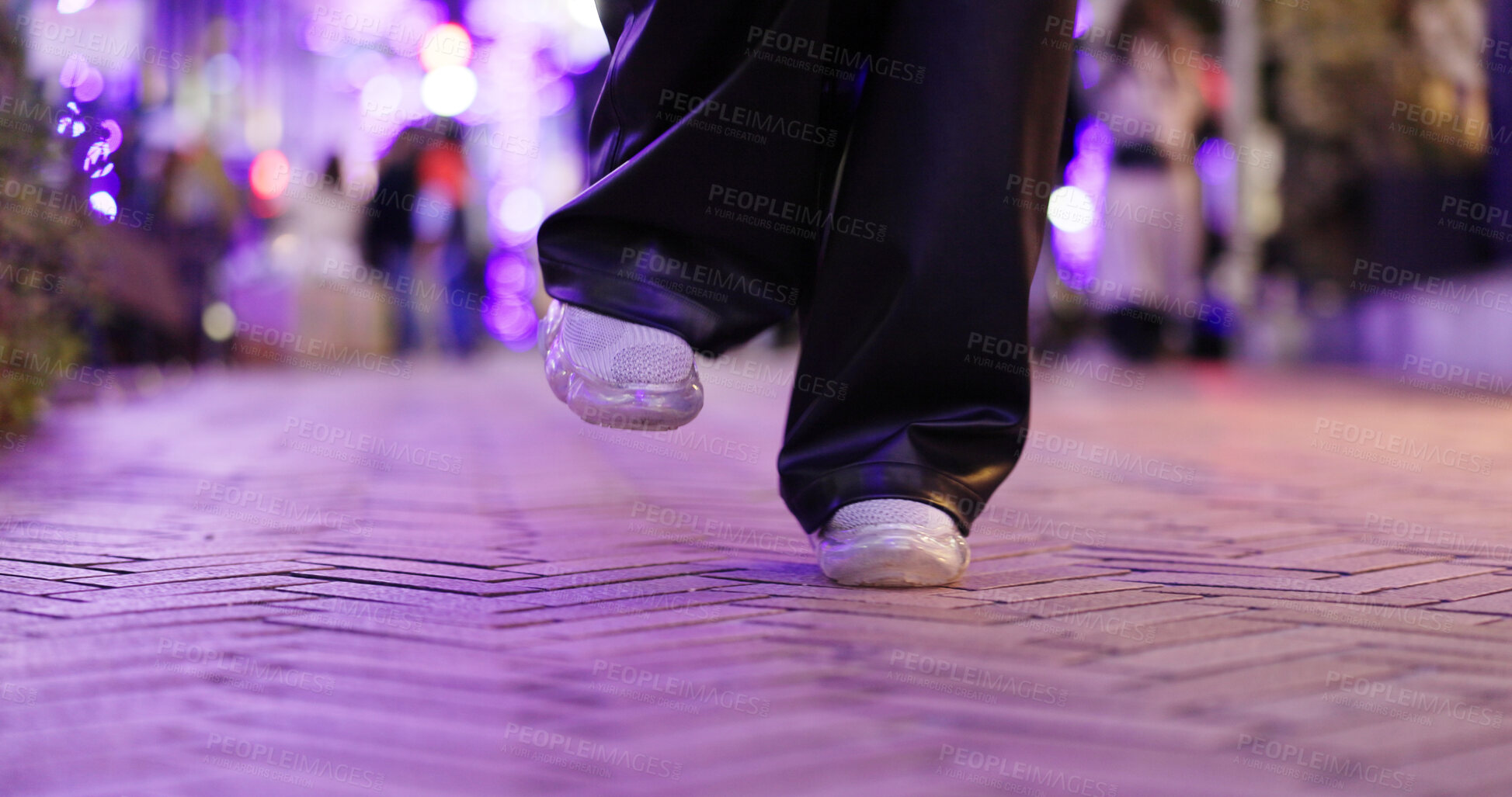 Buy stock photo Closeup, feet and person dancing in street, moving body or freedom for performance, city or night. Girl, dancer or sneakers for art, concert and steps with creativity, metro road and balance in Tokyo