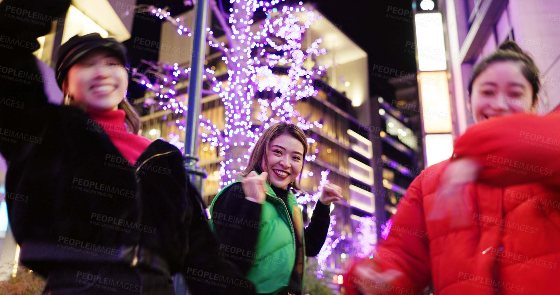 Buy stock photo Japanese women at night, dancing in city and fun with energy, happiness and celebration outdoor. Freedom, dancer group and smile on urban street in Tokyo, friends together and gen z with nightlife