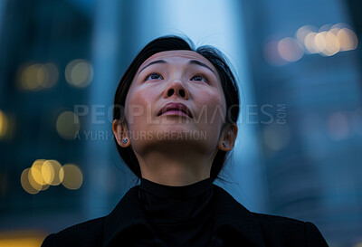 Portrait, street business and asian woman looking up in the city for freelancer, commute and urban travel. Serious, confident and female entrepreneur walking and smiling for exploration and leadership