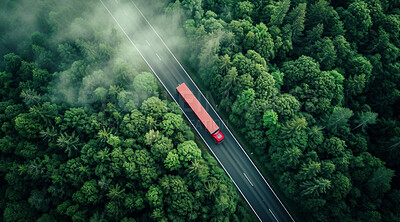Highway, road and truck drone view of a path through the forest for vacation, adventure and transportation. Clean, green and jungle landscape for environment, sustainability and ecology background