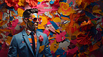 Man in suit, sunglasses, surrounded by colorful background shapes and confetti. Dapper, confident and festive individual exuding style, vibrancy and celebration in a dynamic visual display.