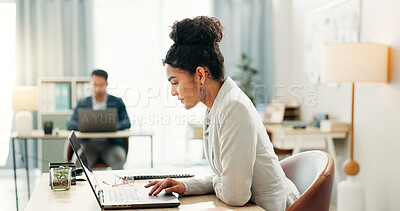 Woman with desk, laptop and typing in coworking space, market research and online schedule at consulting agency. Office, admin business and girl at computer writing email review, feedback or report.