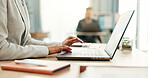 Hands of woman at desk, laptop and typing in coworking space, research and online schedule at consulting agency. Office, admin business and girl at computer writing email review, feedback or report.