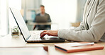 Hands of woman at desk, laptop and typing in coworking space, research and online schedule at consulting agency. Office, admin business and girl at computer writing email review, feedback or report.