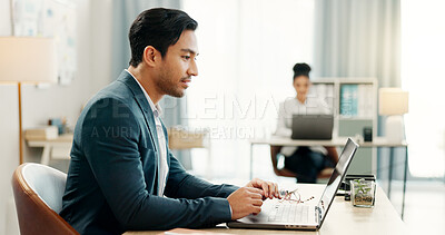 Man at desk, laptop and typing in coworking space, market research and online schedule at consulting agency. Office, admin and happy businessman at computer writing email review, feedback or report.