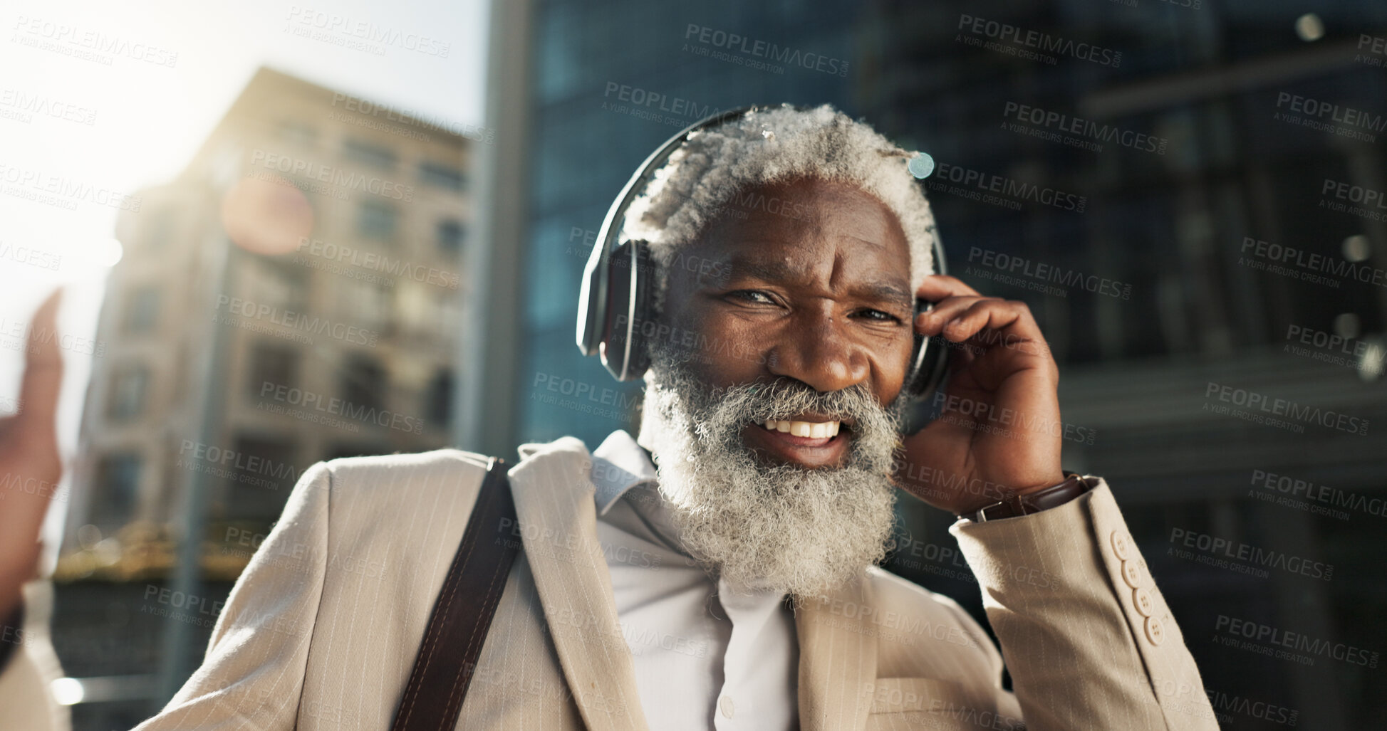 Buy stock photo Happy, dancing and senior businessman with headphones in the city walking and listening to music. Smile, happy and elderly African male person streaming playlist, song or radio commuting in town.