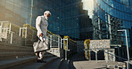 City, business and stairs with old man, walking and corporate with a briefcase, sunshine and buildings. Elderly person, employee and entrepreneur with urban town, steps and New York with professional