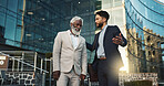 Business men, friends and walk in street, check watch and ready for meeting, schedule or happy in city. Partnership, time management and direction to workplace with discussion, road or metro sidewalk