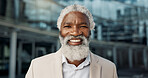 Face, smile and mature business black man in lobby of glass office for corporate employment or career closeup. Portrait, professional and confidence with happy CEO, manager or executive at work